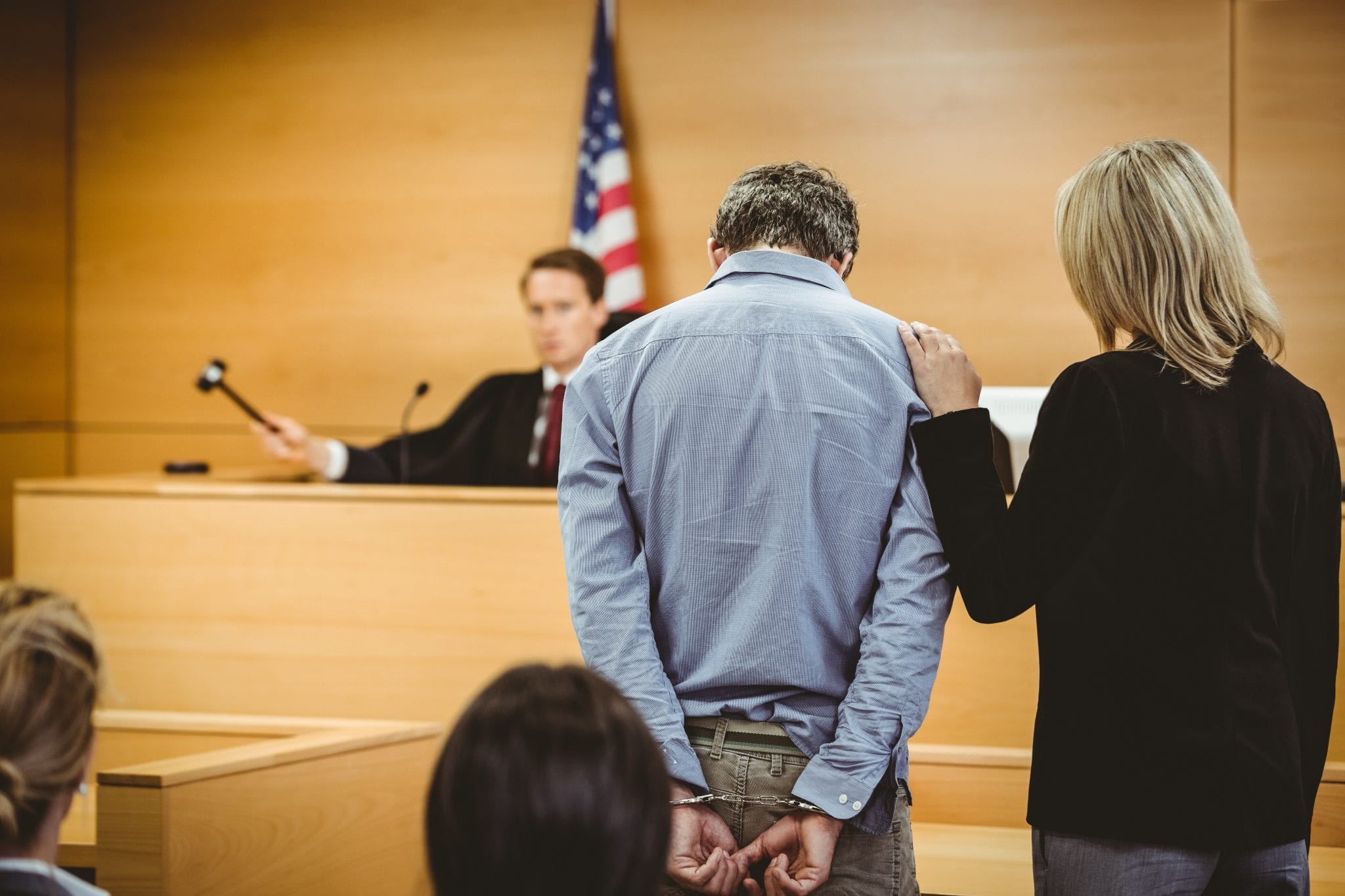 The Competency of the Defendant Is Discussed in a Courtroom.